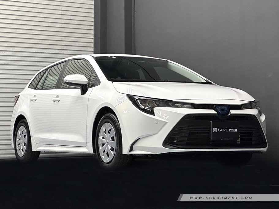Toyota Corolla Touring Hybrid 1.8 X 9
