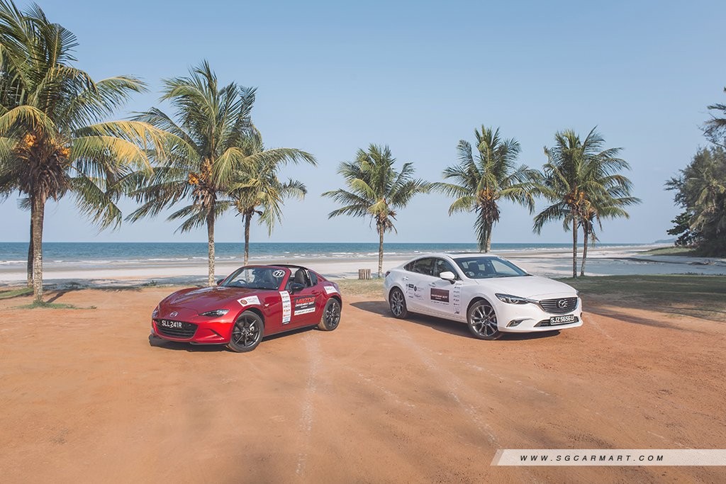 Which way do you zoom with Mazda?
