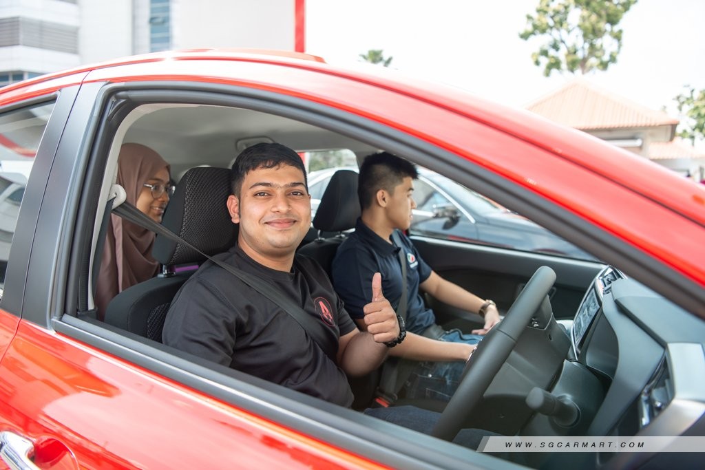 Guy Smiling in car