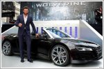 Hugh Jackman arrives at The Wolverine premiere in an Audi R8