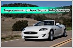 Angry woman drives Jaguar into stranger