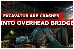 Excavator arm crashes into overhead bridge along Balestier Road