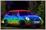 Man lights up his MINI Electric to spread festive cheer and raise money for charity